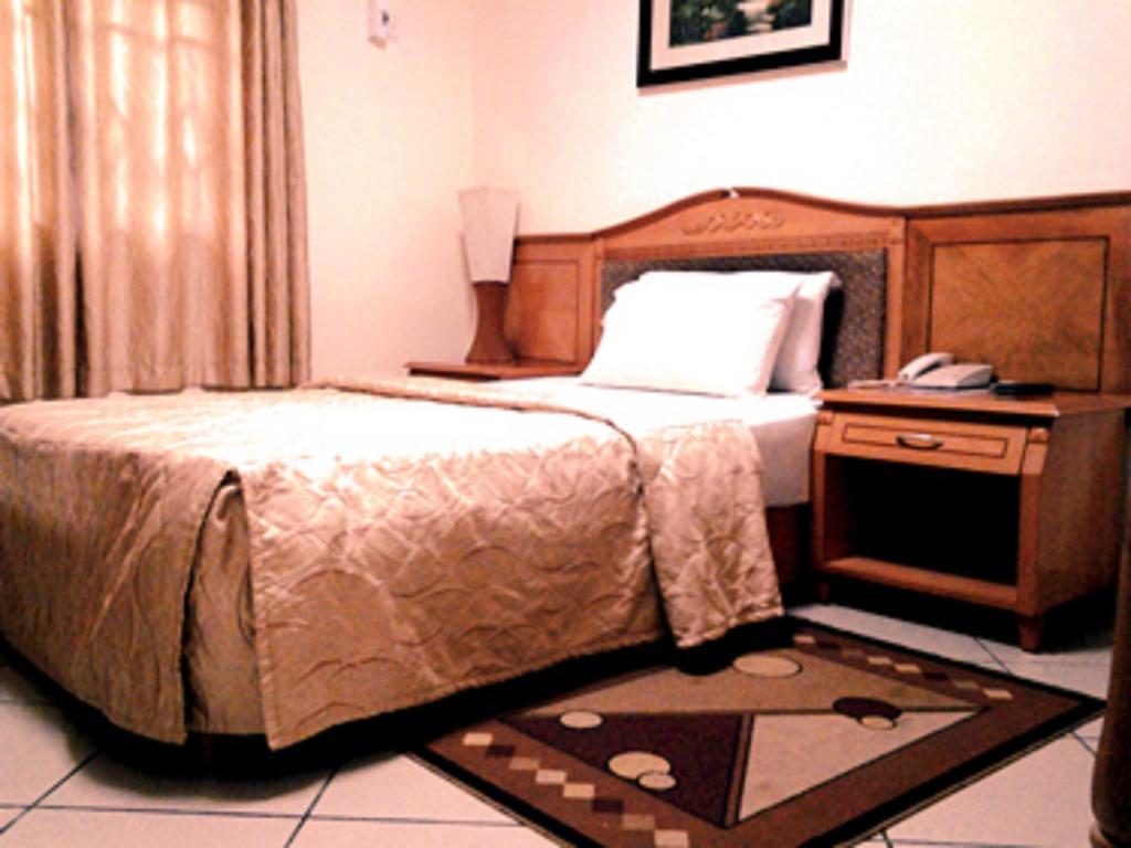 Sunset Hotel Kumasi Oda fotoğraf