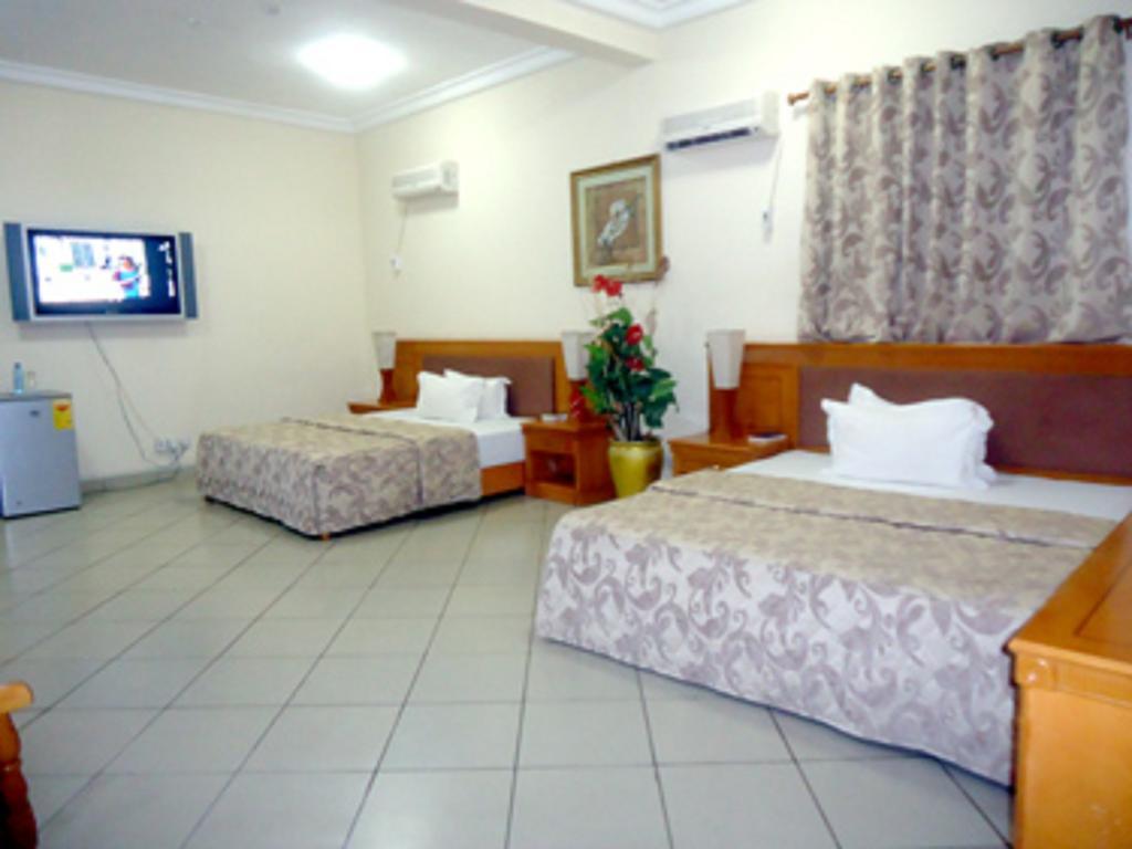 Sunset Hotel Kumasi Oda fotoğraf